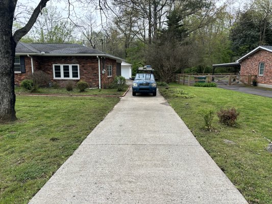 Water rinse on a wood fence during outdoor cleaning